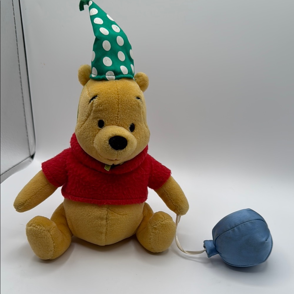 Disney Gund Winnie the Pooh birthday plush toy with green hat and red shirt